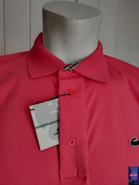 Поло коралового кольору застібка на гудзиках Lacoste 22 фото