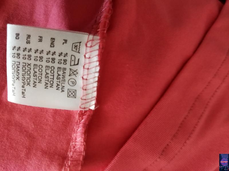 Поло коралового кольору застібка на гудзиках Lacoste 22 фото